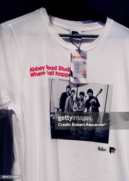 Souvenir T-shirts are among the Beatles-related items for sale at Abbey Road Shop, located near Abbey Road Studios in London, England, formerly known...