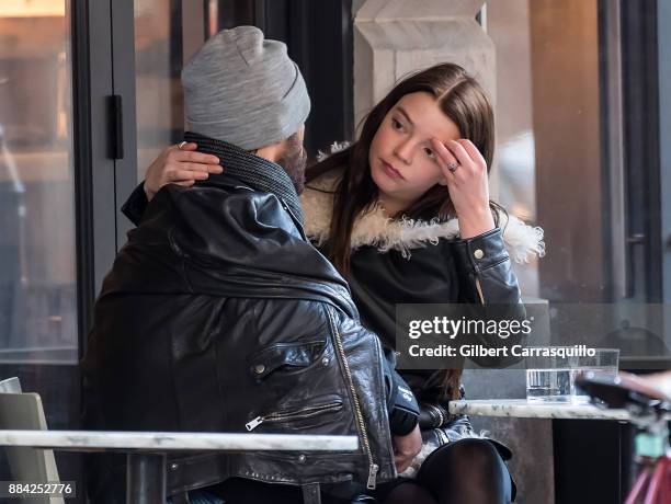 Actor Eoin Macken and his fiancee actress Anya Taylor-Joy are seen outside a restaurant on December 1, 2017 in Philadelphia, Pennsylvania.