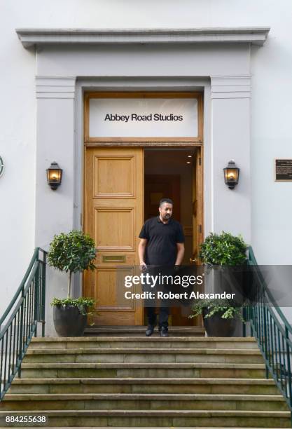 An employee leaves Abbey Road Studios in London, England, formerly known as EMI Studios. The recording studio was established in 1931 by the...