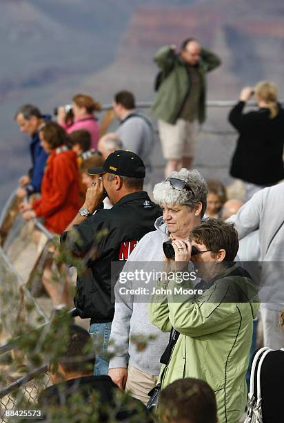 Tourists gather to see the view at Mather Point June 10, 2009 in the Grand Canyon National Park, Arizona. Work began this week with federal stimulus...