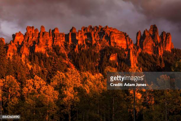 cimarron range glowing red at sunset - alpenglow - fotografias e filmes do acervo