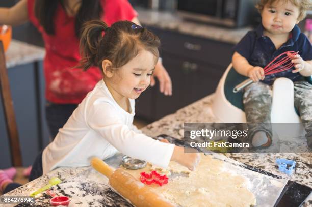 family baking day! - modern baby nursery stock pictures, royalty-free photos & images