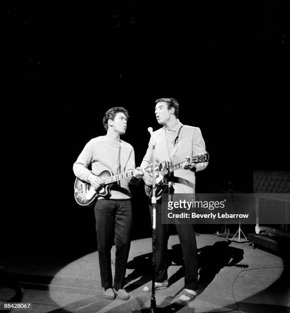 Photo of Marty WILDE and Cliff RICHARD, with Marty Wilde, performing live onstage on 'Oh Boy!' TV show
