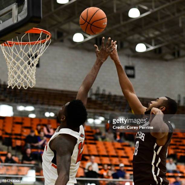 Ed Porter of the Lehigh Mountain Hawks shoots the ball against Myles Stephens of the Princeton Tigers during the second half at L. Stockwell Jadwin...