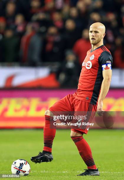 Michael Bradley of Toronto FC dribbles the ball during the MLS Eastern Conference Finals, Leg 2 game against Columbus Crew SC at BMO Field on...