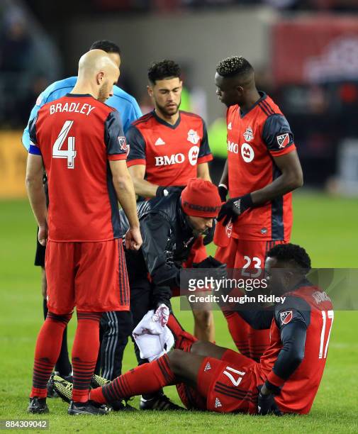 Jozy Altidore of Toronto FC is helped to his feet after injuring his ankle during the second half of the MLS Eastern Conference Finals, Leg 2 game...