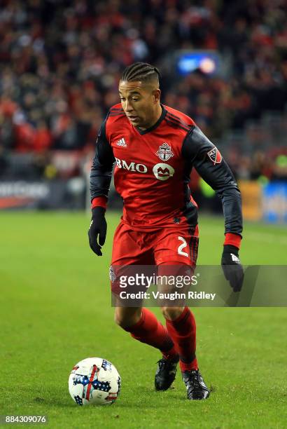Justin Morrow of Toronto FC dribbles the ball during the MLS Eastern Conference Finals, Leg 2 game against Columbus Crew SC at BMO Field on November...