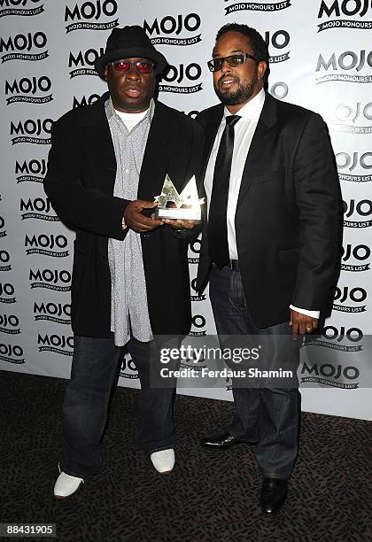 Vince Wilburn and Erin Davis with the MOJO Catalogue award for the Miles Davies Kind of Blue 50th Anniversary Edition during the 2009 MOJO Honours...