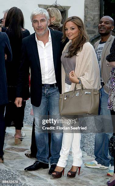 Estefania Kuester and Pino Persico arrive at the wedding-eve party the day before the wedding of Boris Becker and Sharlely Kerssenberg at Chesa...