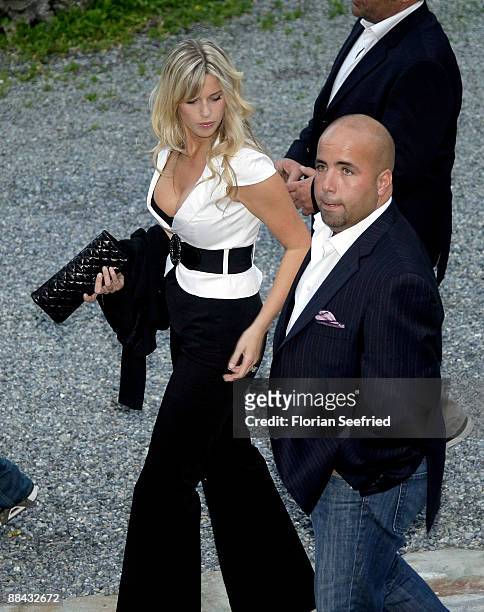 Luis Garcia Fanjul, who will be the best man at the wedding of Boris Becker, and Judith Kamps arrive at the wedding-eve party the day before the...