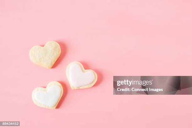heart shaped biscuits - three objects stock pictures, royalty-free photos & images