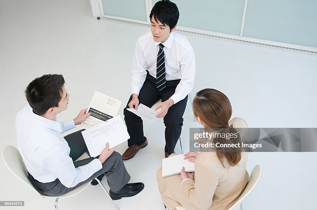 Elevated view of businesspeople having a meeting