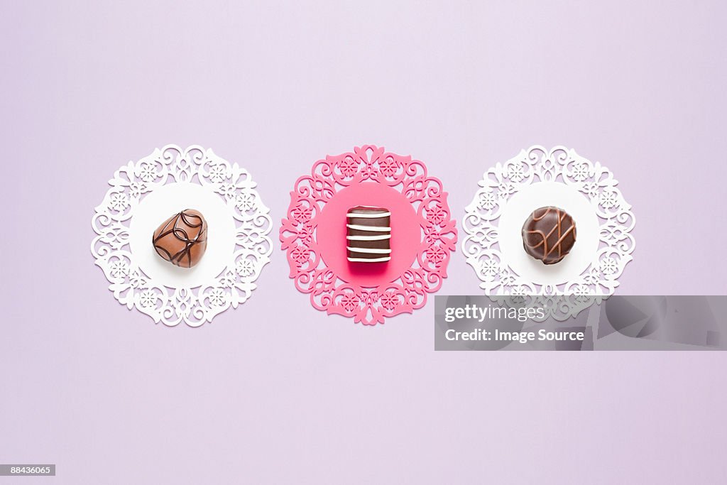 Chocolates on doilies