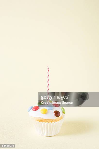 cupcake with candle - cupcake candle stock pictures, royalty-free photos & images
