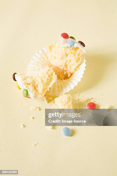 eaten cup cake - cupcake holder stock pictures, royalty-free photos & images