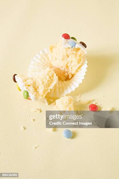 eaten cup cake - cupcake holder stock pictures, royalty-free photos & images