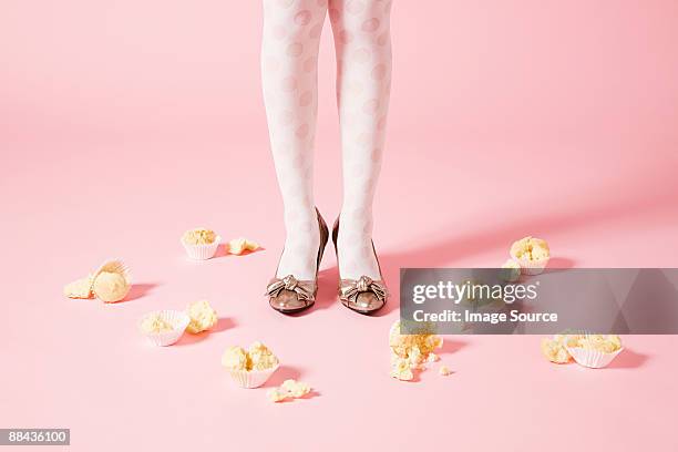 legs of woman and cakes - calze di nylon foto e immagini stock