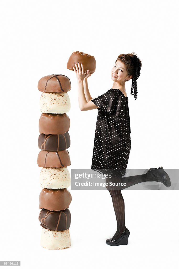 Woman with large chocolates