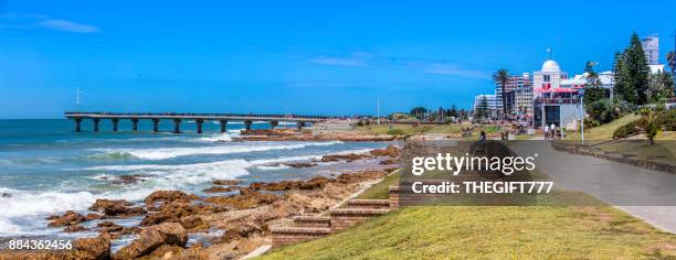 port elizabeth pier and rocky coast panorama, south africa - port elizabeth stock pictures, royalty-free photos & images