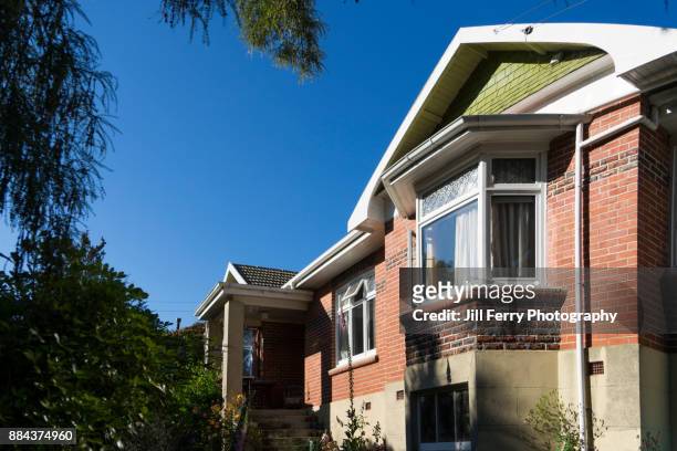 red brick house - dunedin nz stock pictures, royalty-free photos & images