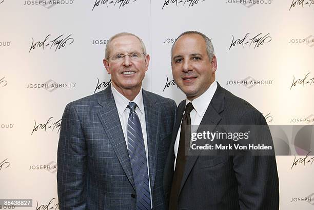 New York Giants Coach Tom Coughlin and Ross Gershkowitz pose for a photo at the dress to win event hosted by Joseph Abboud and Lord & Taylor at Lord...