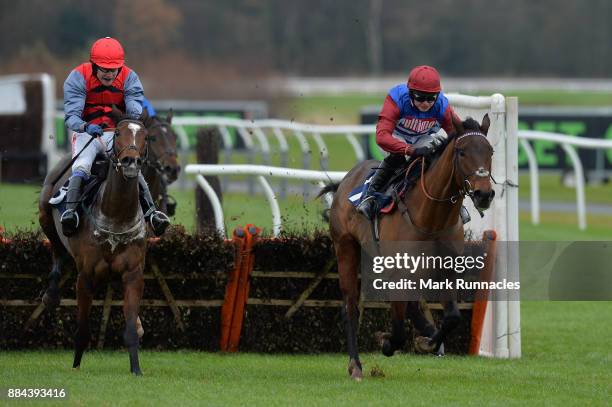 Sean Bowen riding Act Of Valour , leads the way from Tom Scudamore riding Look My Way ahead of winning the Jigsaw Sports Branding Introductory...