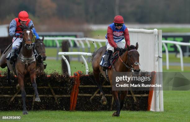 Sean Bowen riding Act Of Valour , leads the way from Tom Scudamore riding Look My Way ahead of winning the Jigsaw Sports Branding Introductory...