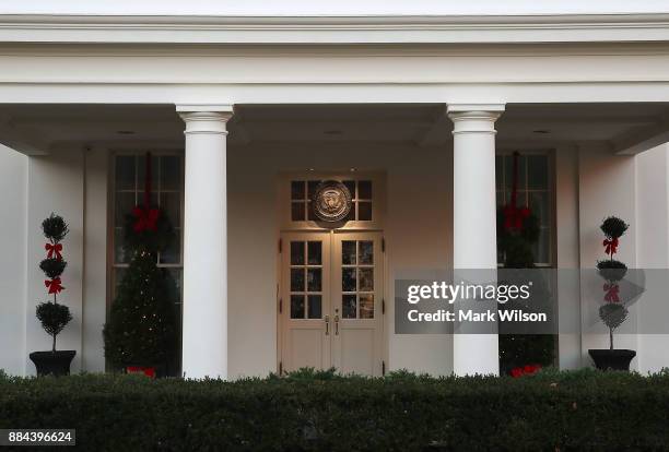 Light shines down from The West Wing entrance to the White House on December 2, 2017 in Washington, DC. Later today U.S. President Donald Trump will...