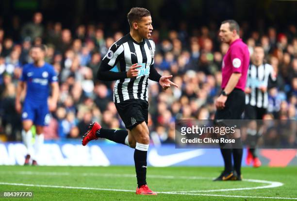 Dwight Gayle of Newcastle United celebrates after scoring his sides first goal during the Premier League match between Chelsea and Newcastle United...