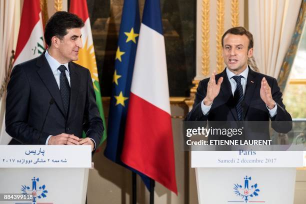 French President Emmanuel Macron gestures as he addresses a joint press conference with Regional Kurdistan Government Prime Minister Nechirvan...