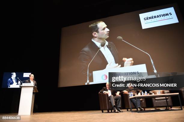 Benoit Hamon , leader of the left-wing political movement "First of July movement" , speaks next to member of the Parliament from the Ecologist group...