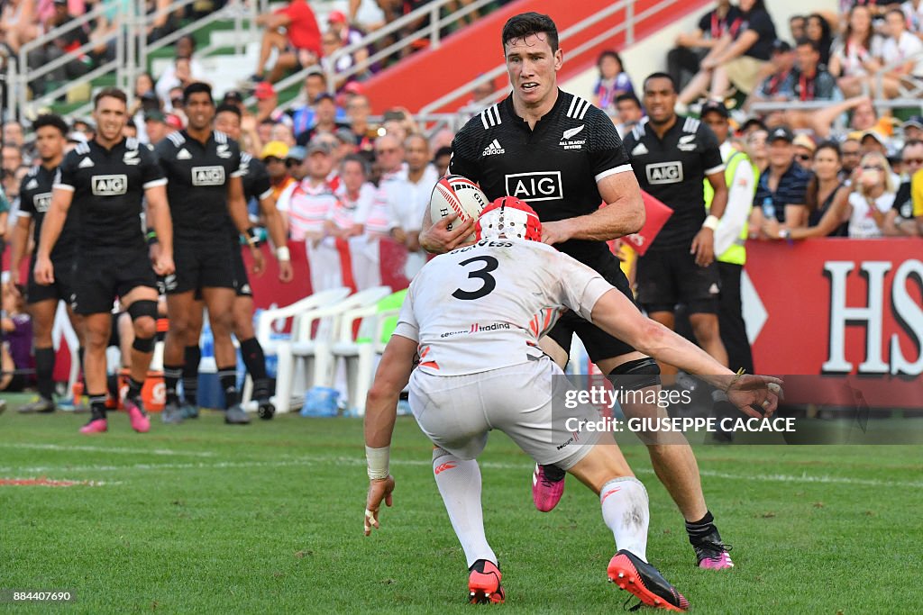 Sam Dickson Rugby Sam Dickson of New Zealand vies for the ball against Phil Burgess of ...