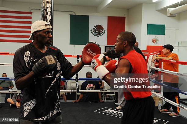 Trainer Roger Mayweather and boxer Floyd Mayweather trains at Las Vegas Boxing Gym on June 11, 2009 in Las Vegas, Nevada.