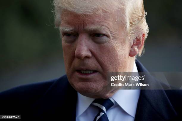 President Donald Trump speaks to the media before departing the White House on Marine One, on December 2, 2017 in Washington, DC. Later today U.S....