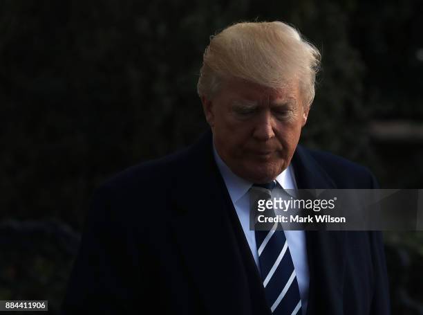 President Donald Trump walks up to the media before departing the White House on Marine One, on December 2, 2017 in Washington, DC. Later today U.S....