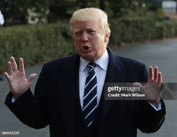 President Donald Trump speaks to the media before departing the White House on Marine One, on December 2, 2017 in Washington, DC. Later today U.S....