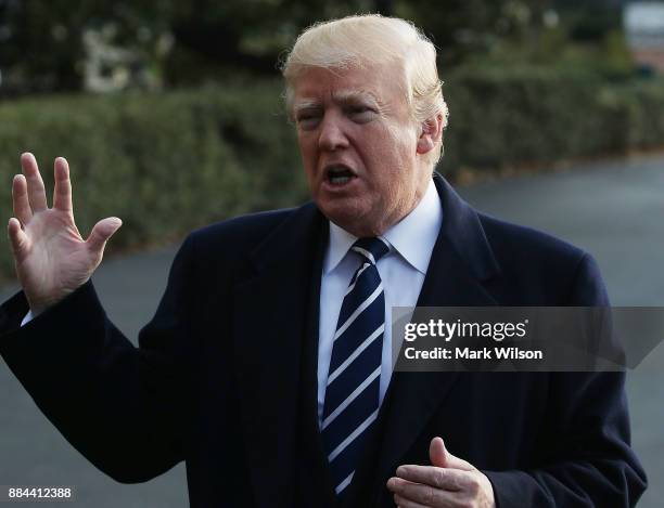 President Donald Trump speaks to the media before departing the White House on Marine One, on December 2, 2017 in Washington, DC. Later today U.S....