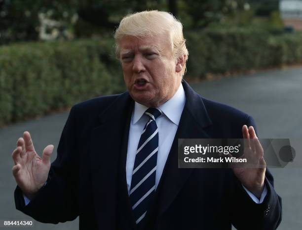 President Donald Trump speaks to the media before departing the White House on Marine One, on December 2, 2017 in Washington, DC. Later today U.S....