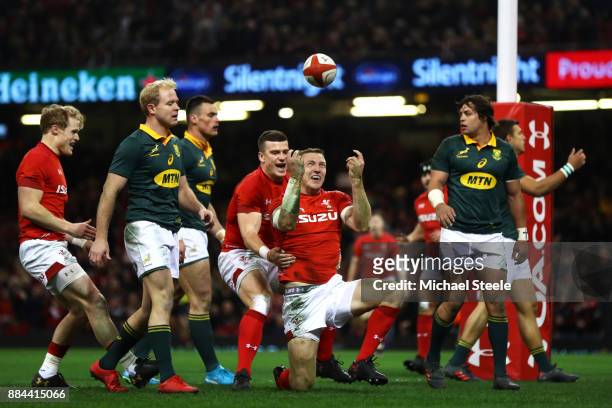 Hadleigh Parkes of Wales celerbates after scoring his sides second try during the international match match between Wales and South Africa at...