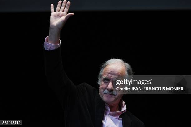 Member of the Europe Ecologie - Les Verts green party Noel Mamere waves during the founding congress of the left-wing political movement Generations...
