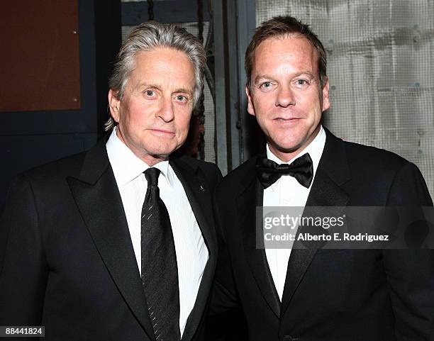 Actor Michael Douglas, recipient of the Life Achievement In Motion Pictures and Television award and actor Kiefer Sutherland attend the AFI Life...