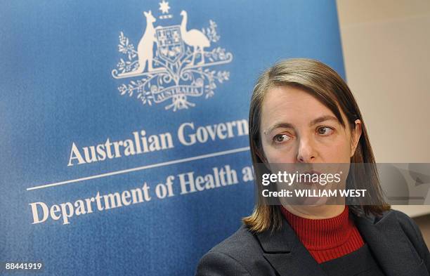 Australian health minister Nicola Roxon speaks to the media as the government played down the threat from swine flu, leaving its alert level...
