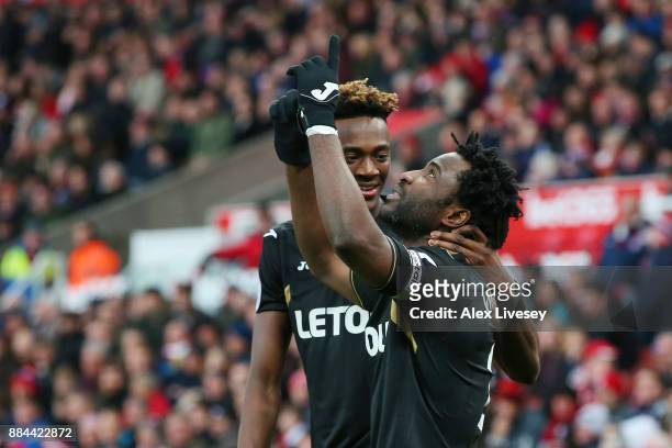 Wilfried Bony of Swansea City celebrates after scoring his sides first goal with Tammy Abraham of Swansea City during the Premier League match...