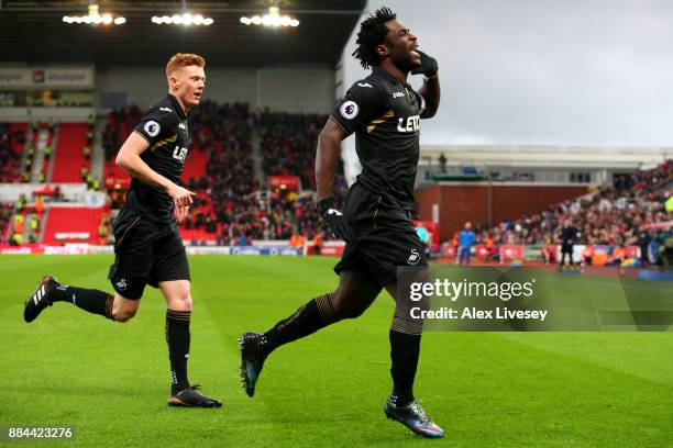 Wilfried Bony of Swansea City celebrates after scoring his sides first goal during the Premier League match between Stoke City and Swansea City at...