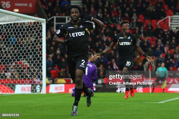 Wilfried Bony of Swansea City celebrates scoring his sides first goal of the match during the Premier League match between Stoke City and Swansea...