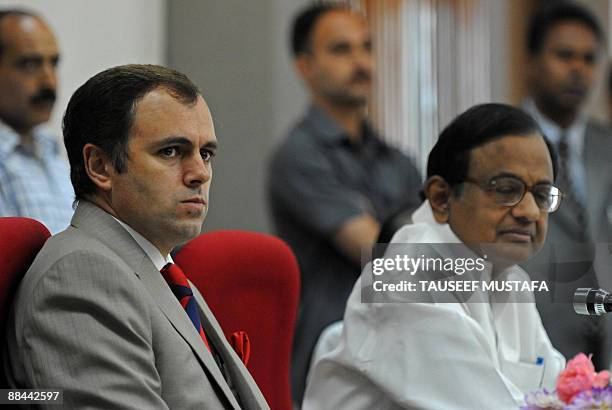 Jammu and Kashmir Chief Minister Omar Abdullah and Indian Home Minister P.Chidambram listen during a press conference in Srinagar on June 12, 2009....