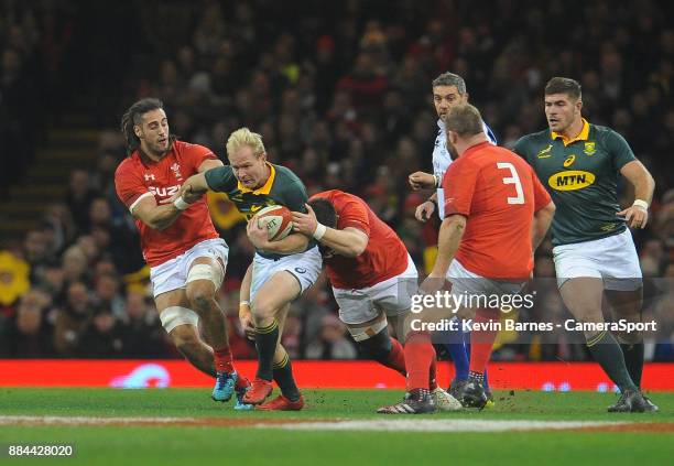 South Africa's Ross Cronje is tackled by Wales' Rob Evans during the 2017 Under Armour Series Autumn International match between Wales and South...