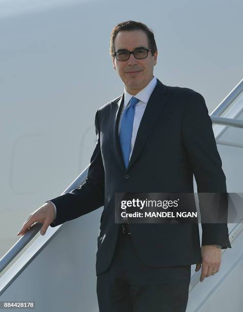 Secretary of the Treasury Steven Mnuchin steps off Air Force One upon arrival at John F. Kennedy International Airport in New York, New York on...