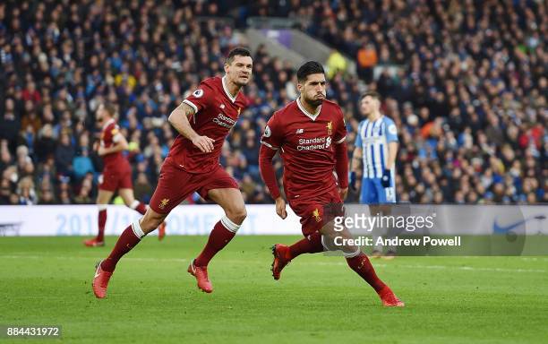 Emre Can of Liverpool Celebrates the opener for Liverpool during the Premier League match between Brighton and Hove Albion and Liverpool at Amex...