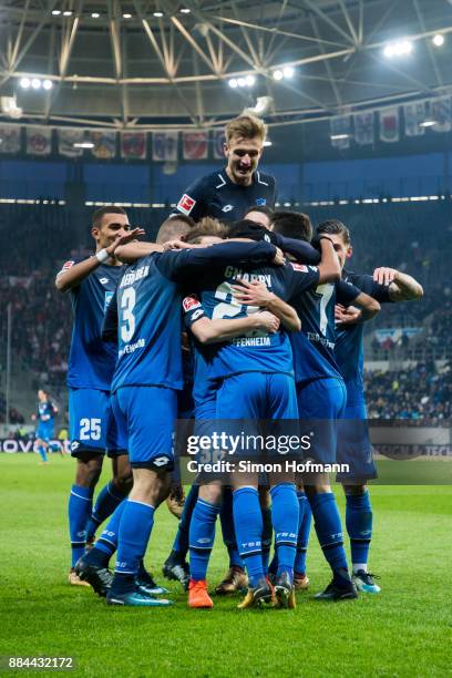 Team mates of Hoffenheim celebrate their seond goal during the Bundesliga match between TSG 1899 Hoffenheim and RB Leipzig at Wirsol...